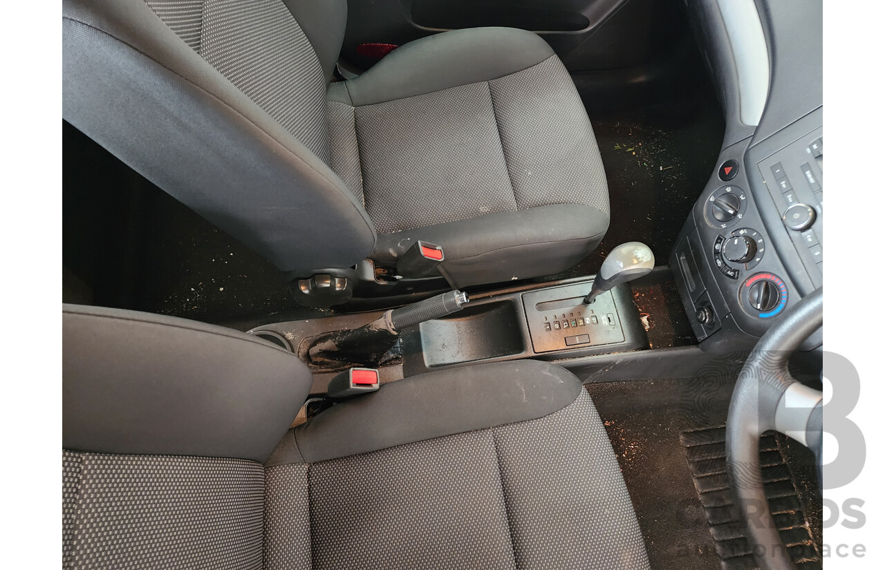 4/2012 Holden Barina Classic TK MY11 4d Sedan Silver 1.6L