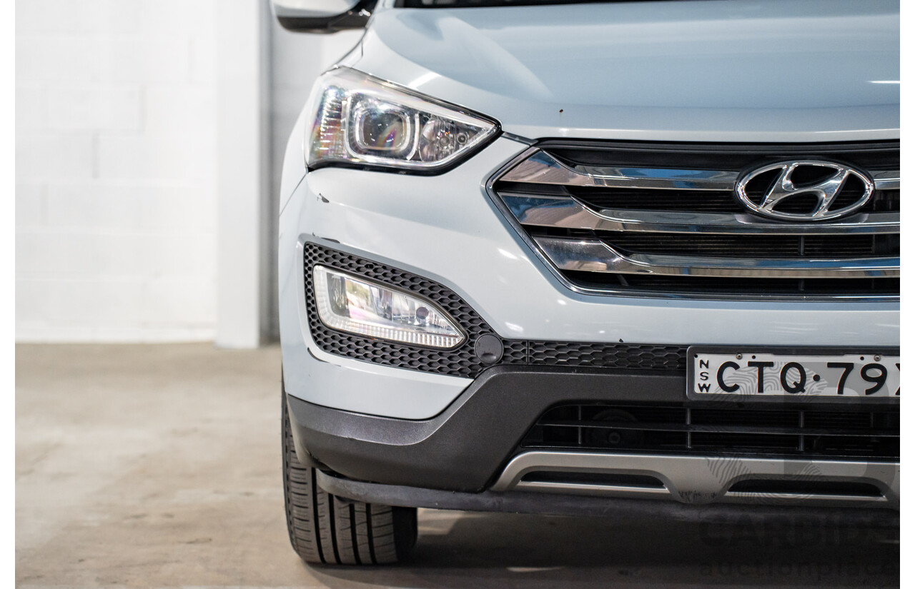 7/2013 Hyundai Santa Fe Elite CRDi (4x4) DM 4d Wagon Glacier Blue Metallic Turbo Diesel 2.2L - 7 Seater