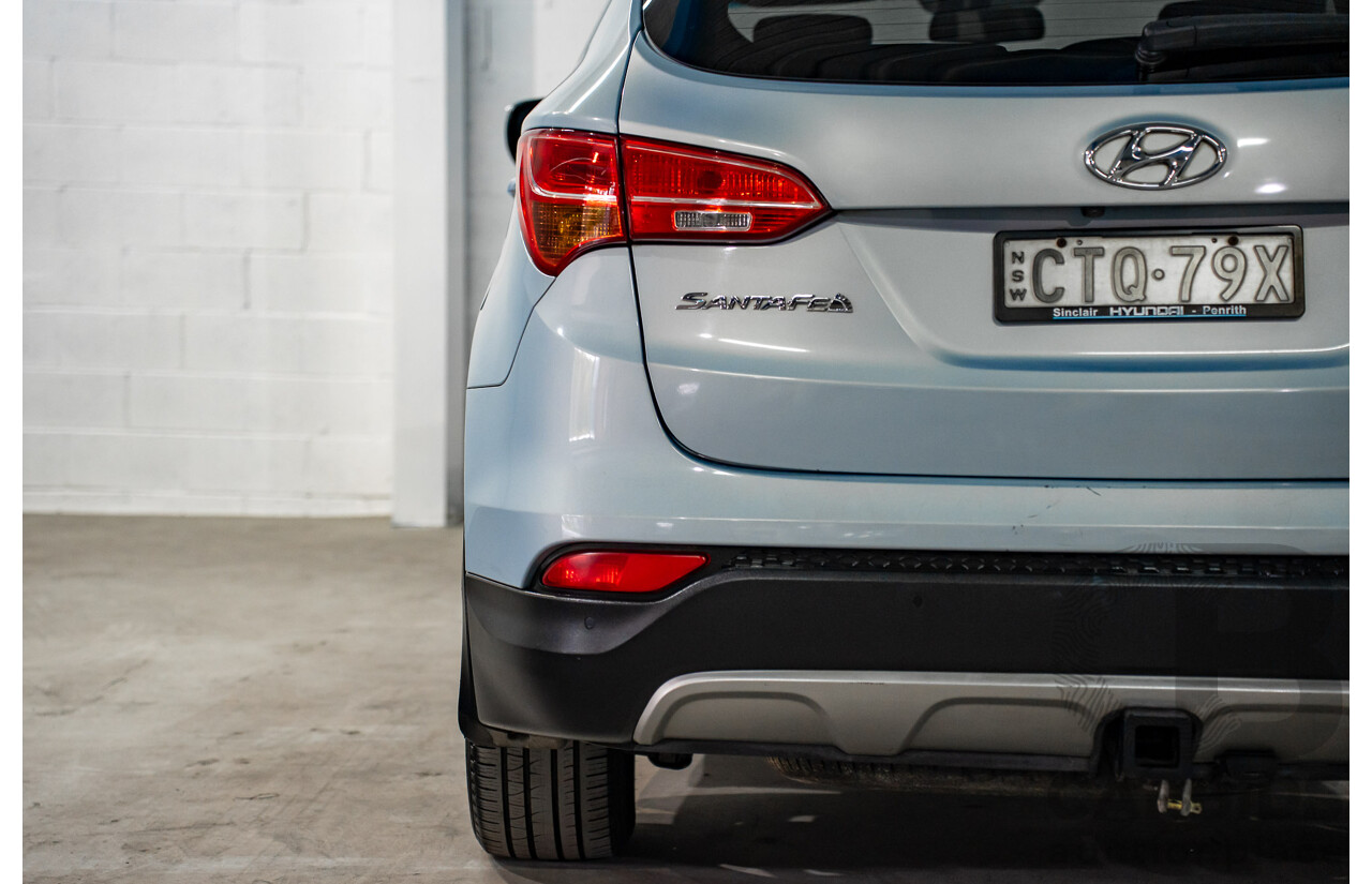 7/2013 Hyundai Santa Fe Elite CRDi (4x4) DM 4d Wagon Glacier Blue Metallic Turbo Diesel 2.2L - 7 Seater
