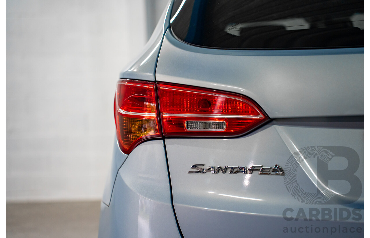 7/2013 Hyundai Santa Fe Elite CRDi (4x4) DM 4d Wagon Glacier Blue Metallic Turbo Diesel 2.2L - 7 Seater