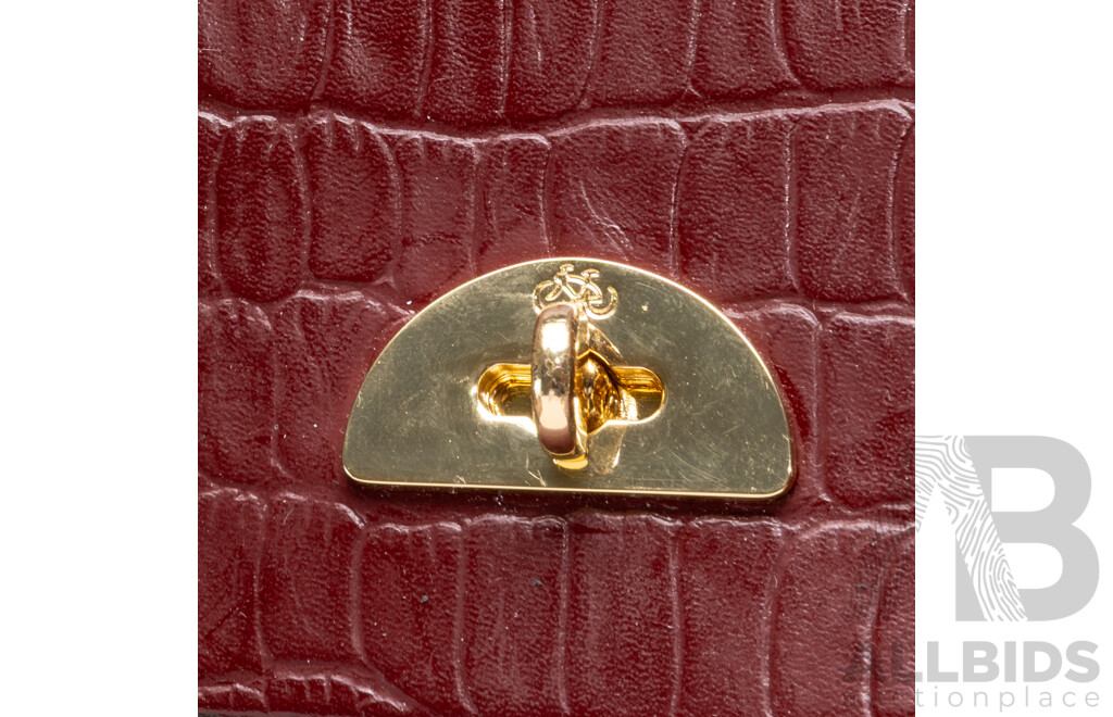 the Cambridge Satchel Company Burgundy Embossed Leather Handbag with Crossbody Strap, Handmade in Great Britain