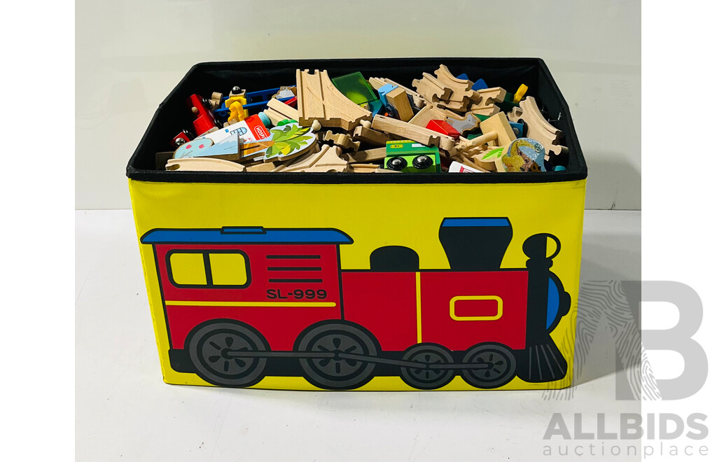 Footstool with Large Collection of Wooden Train Tracks and Trains Stored Inside