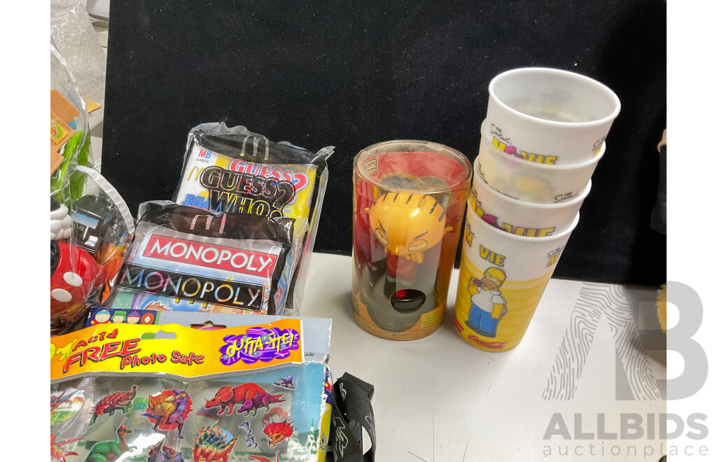 Collection of Toys and Collectibles Including the Simpsons, South Park, Steve Austin, Disney and More