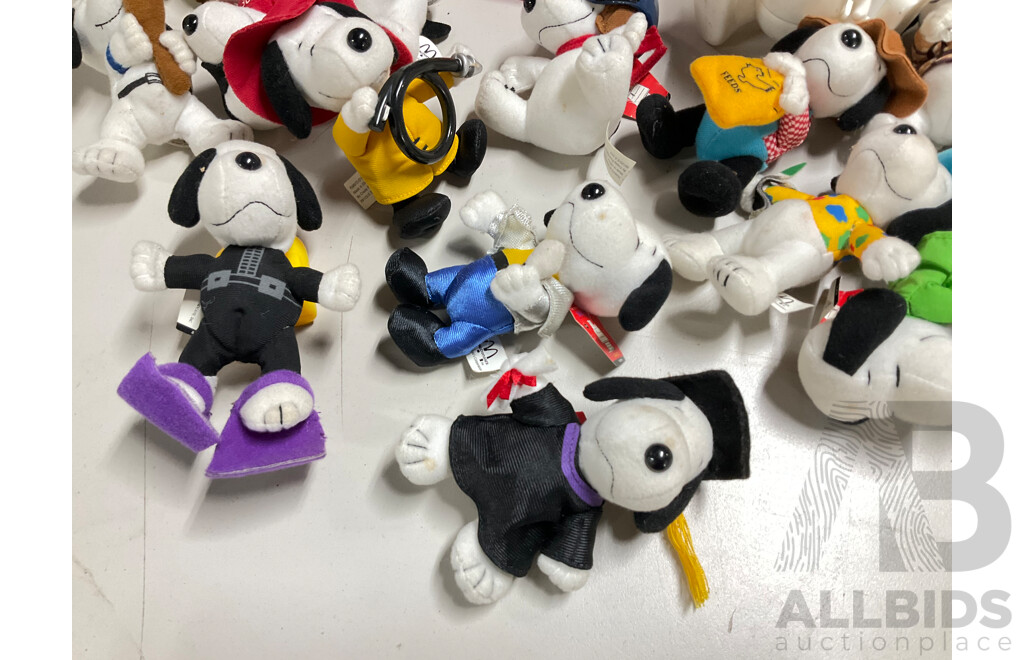 Collection of Snoopy Display Figures Including Joe Cool, Pilot, Plush Examples