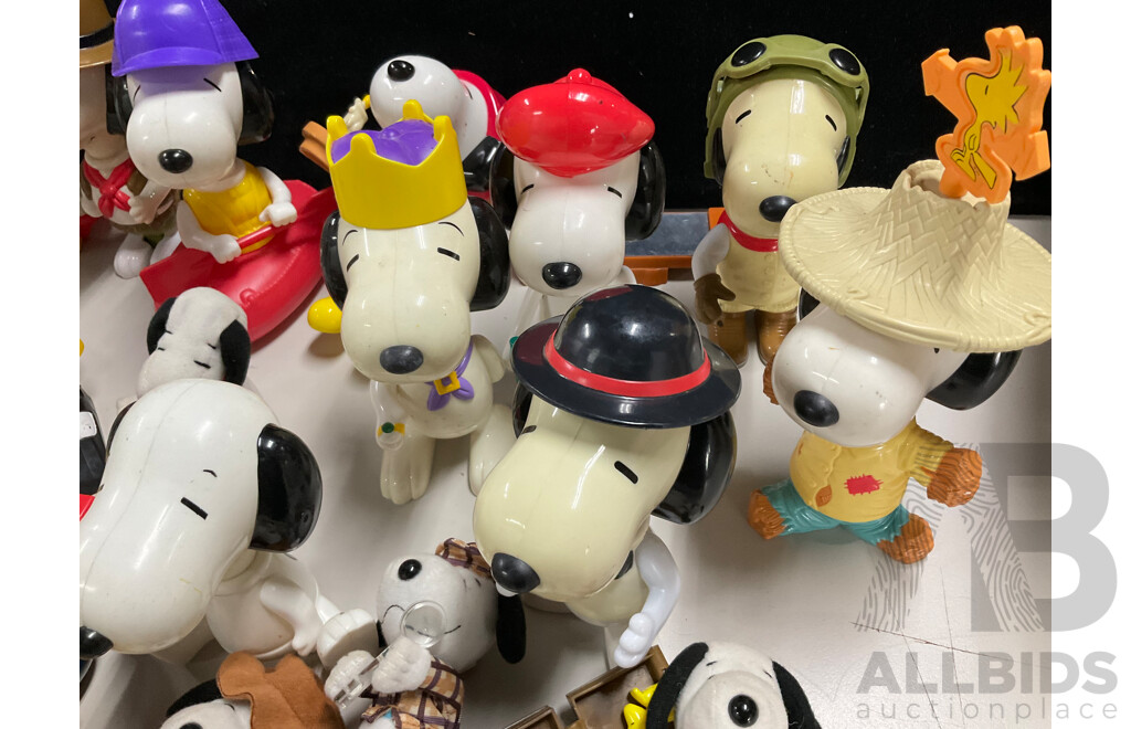 Collection of Snoopy Display Figures Including Joe Cool, Pilot, Plush Examples
