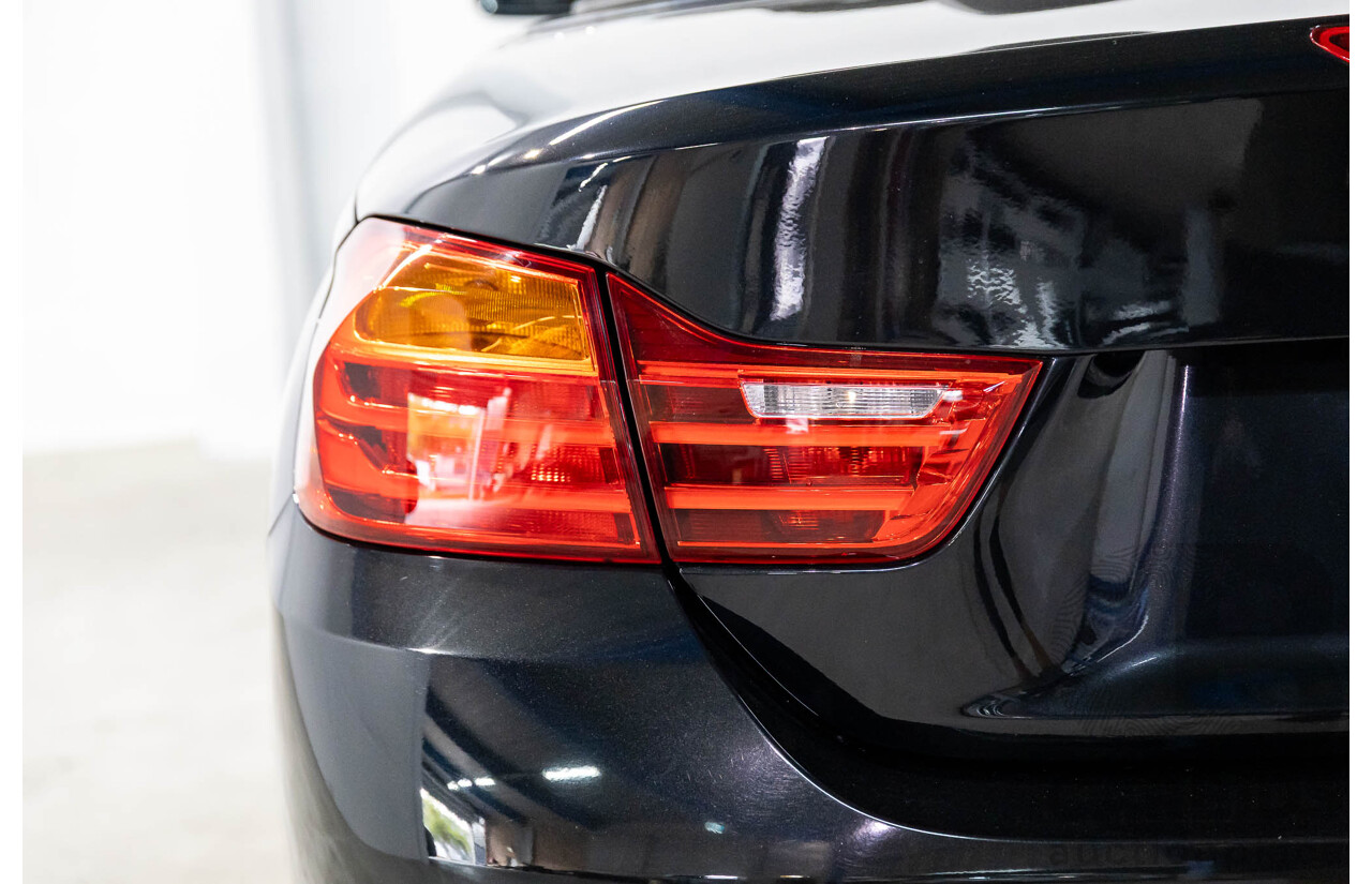 10/2015 BMW 420i Sport Line M Sport F33 MY15 2d Convertible Black Sapphire Metallic Turbo 2.0L
