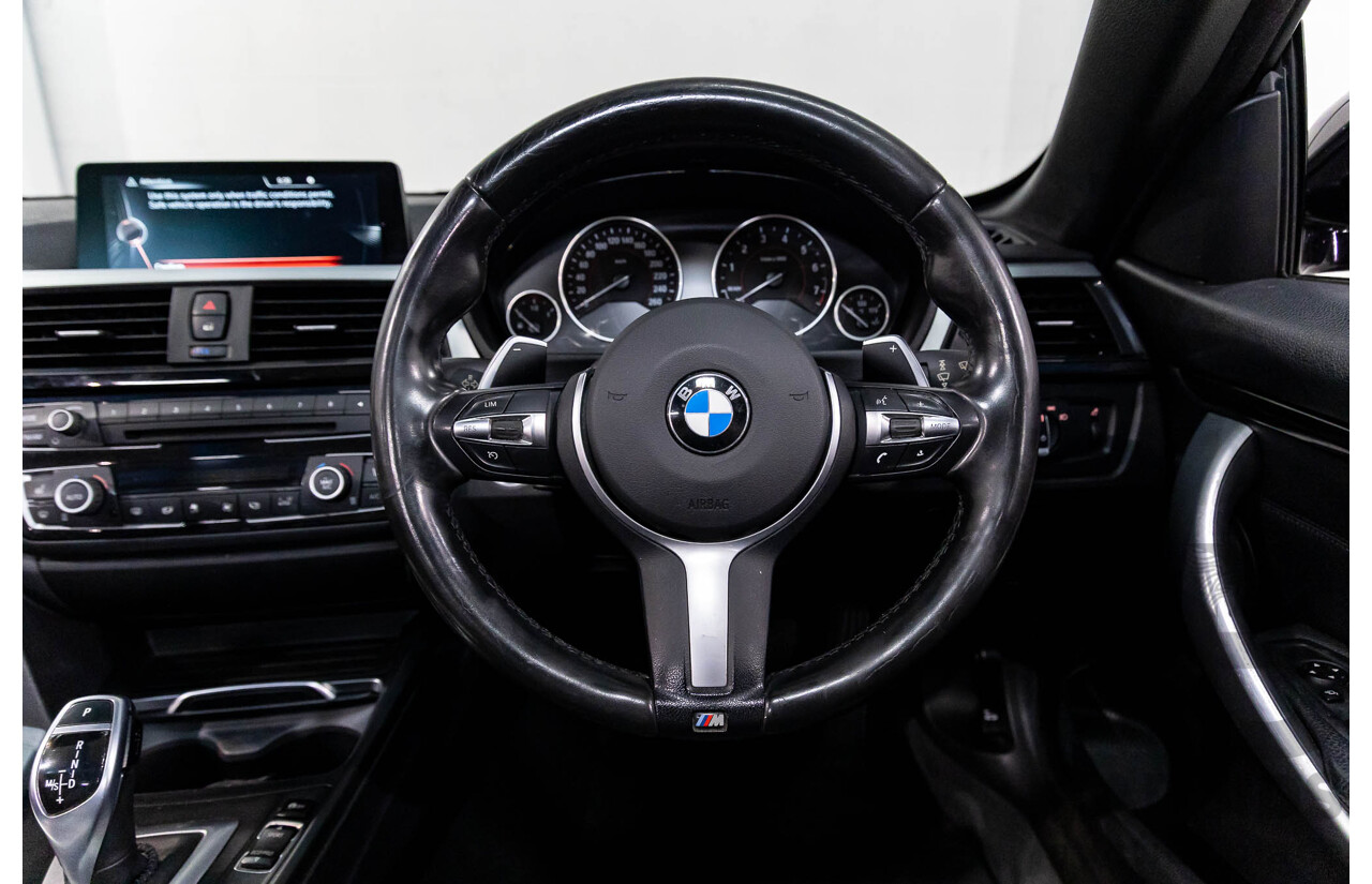 10/2015 BMW 420i Sport Line M Sport F33 MY15 2d Convertible Black Sapphire Metallic Turbo 2.0L