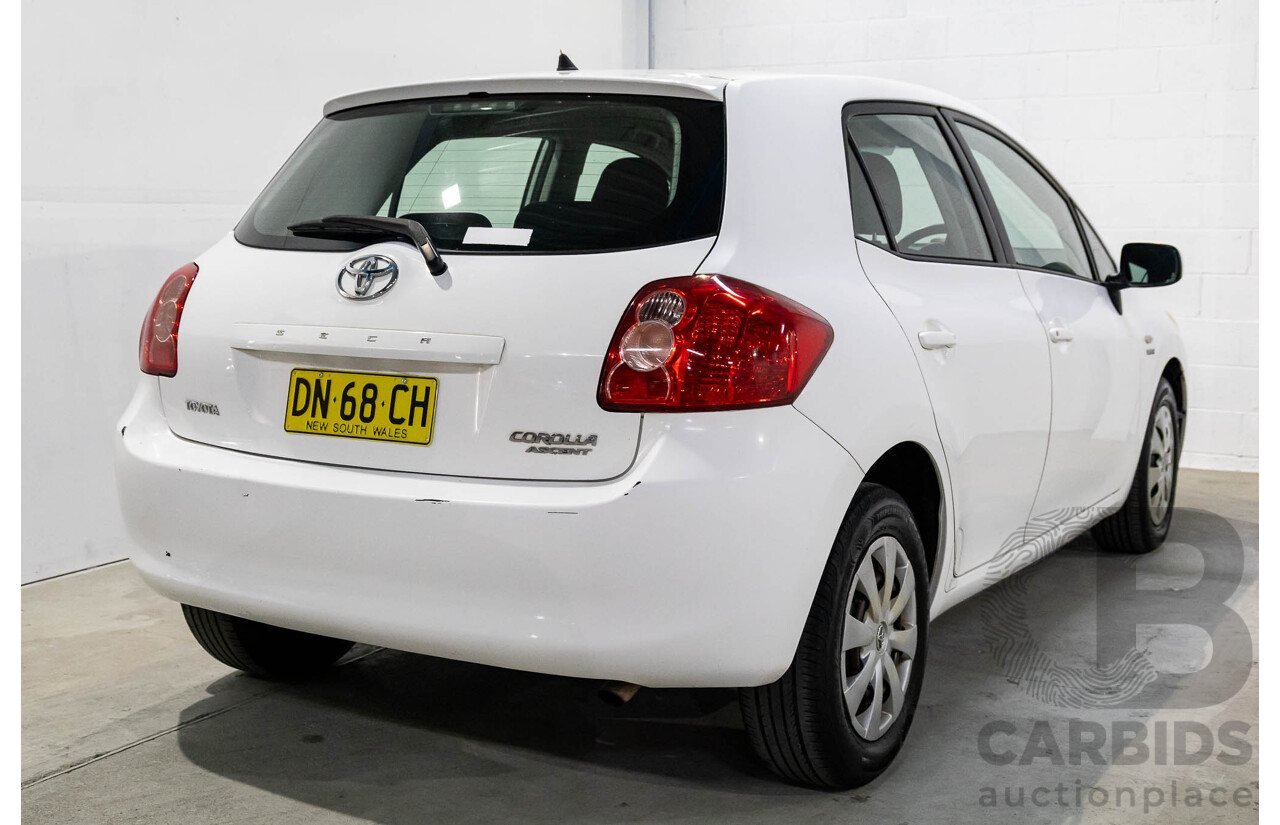 3/2009 Toyota Corolla Ascent ZRE152R 4d Sedan Glacier White 1.8L