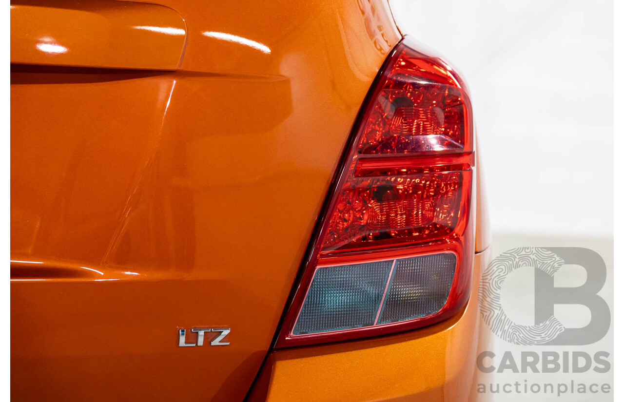 6/2014 Holden Trax LTZ TJ MY15 4d Wagon Orange Rock Metallic 1.8L