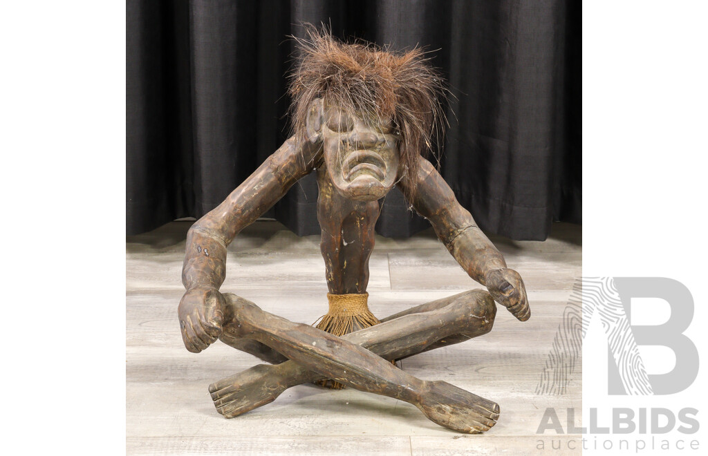 Hand Carved Asian Tribal Style Wood Seated Figure with Fibre Hair Detail