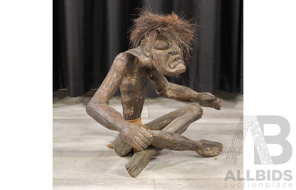 Hand Carved Asian Tribal Style Wood Seated Figure with Fibre Hair Detail