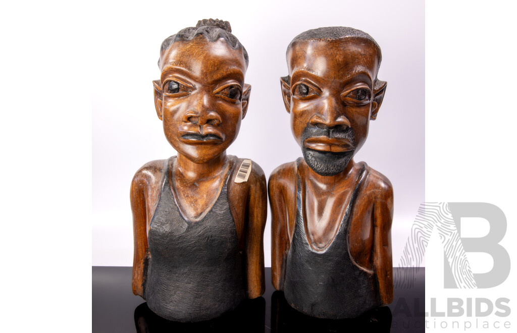 Pair of Hand Carved Hardwood African Male and Female Busts