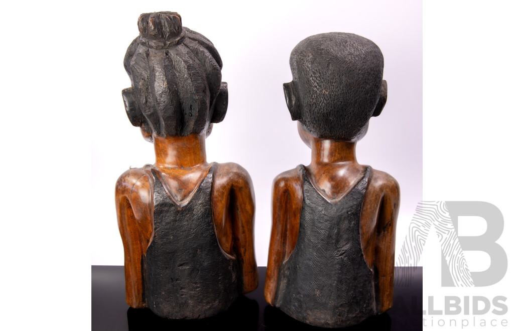 Pair of Hand Carved Hardwood African Male and Female Busts