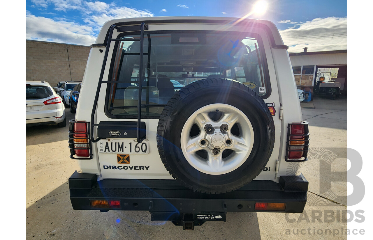 6/1999 Land Rover Discovery SE7 (4x4)  4d Wagon White 4.0L