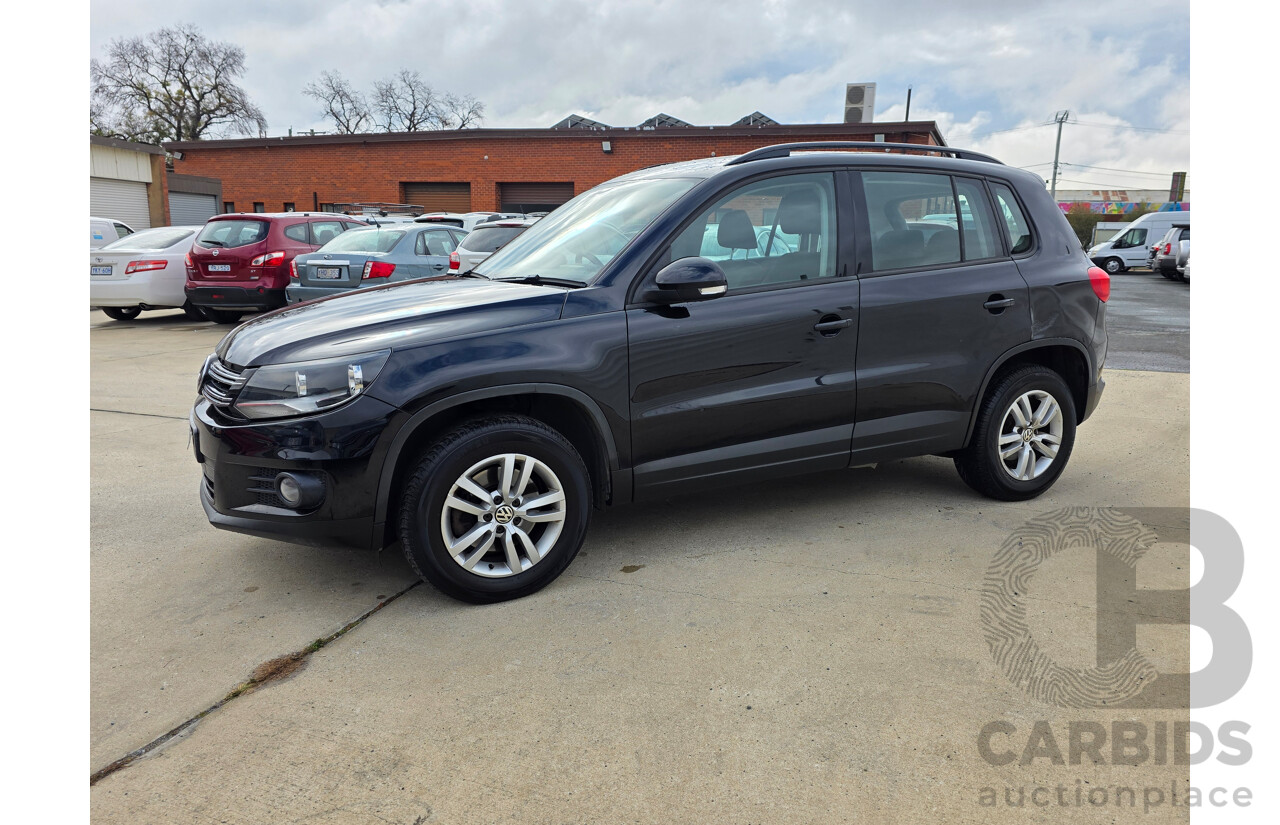 10/2011 Volkswagen Tiguan 103 TDI 5NC MY11 4d Wagon Black 2.0L