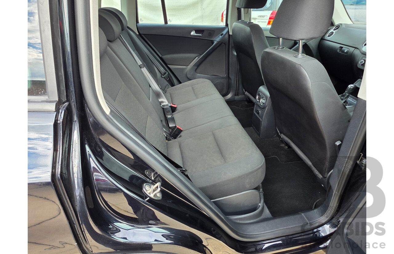 10/2011 Volkswagen Tiguan 103 TDI 5NC MY11 4d Wagon Black 2.0L