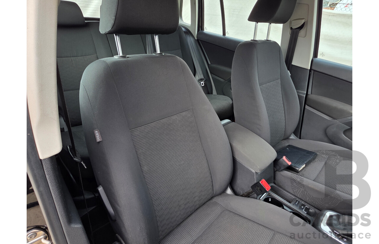 10/2011 Volkswagen Tiguan 103 TDI 5NC MY11 4d Wagon Black 2.0L