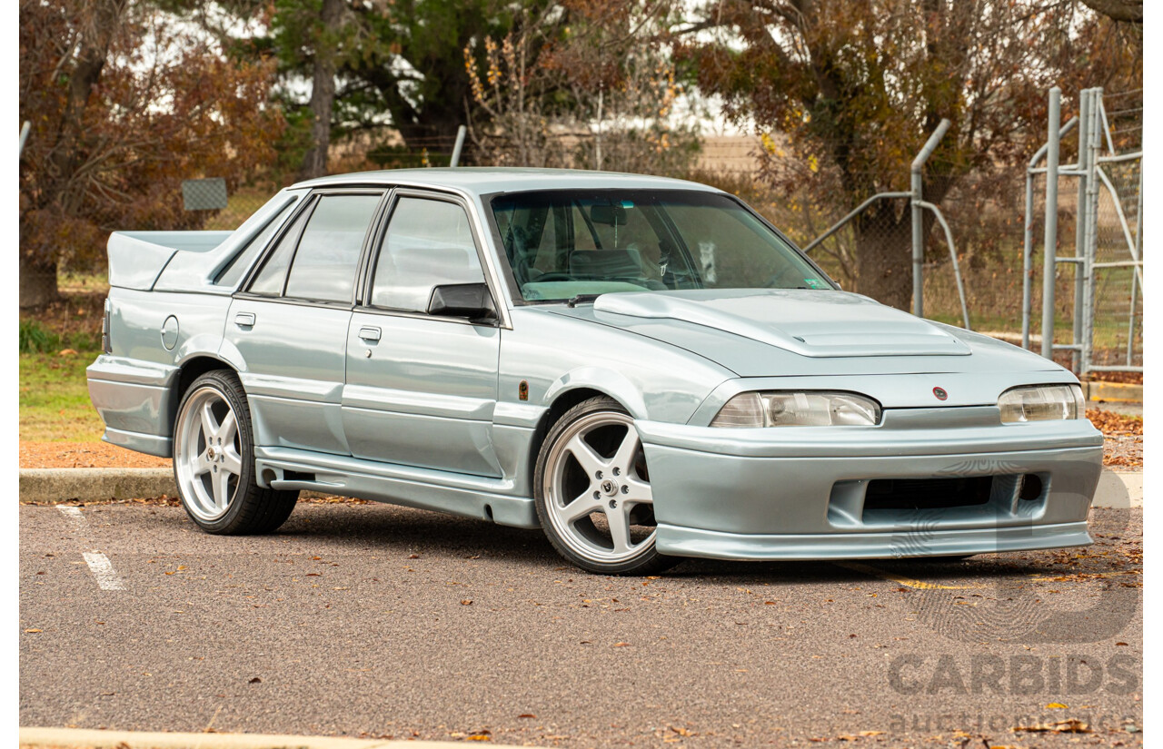 10/1986 Holden VL Commodore Executive - Walkinshaw Group A Replica 4d Sedan Panorama Silver 3.0L