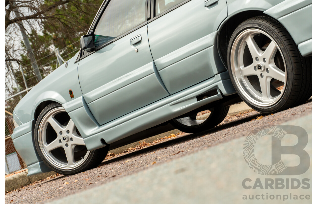 10/1986 Holden VL Commodore Executive - Walkinshaw Group A Replica 4d Sedan Panorama Silver 3.0L