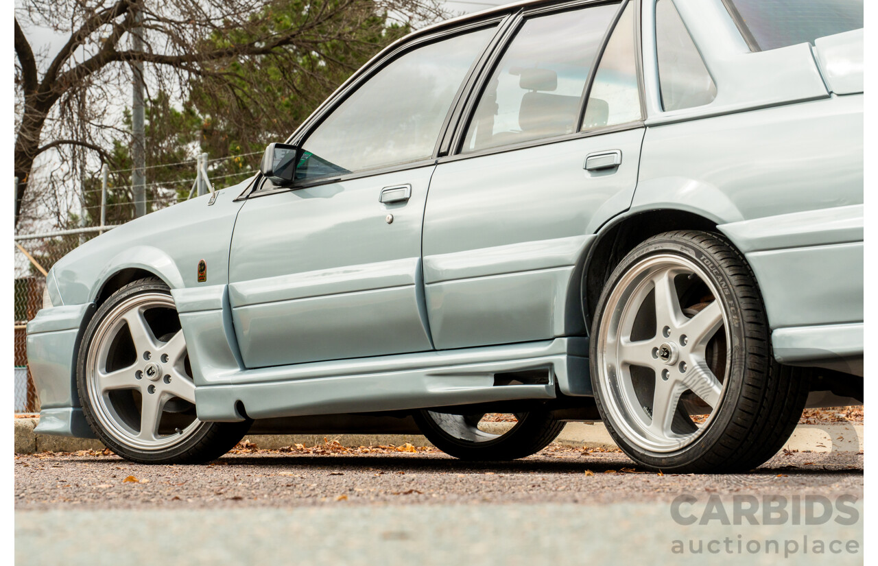 10/1986 Holden VL Commodore Executive - Walkinshaw Group A Replica 4d Sedan Panorama Silver 3.0L