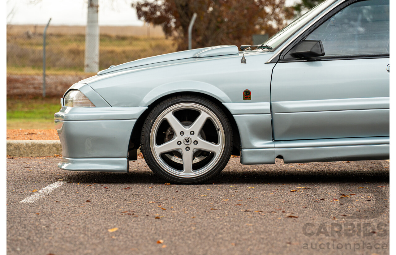 10/1986 Holden VL Commodore Executive - Walkinshaw Group A Replica 4d Sedan Panorama Silver 3.0L