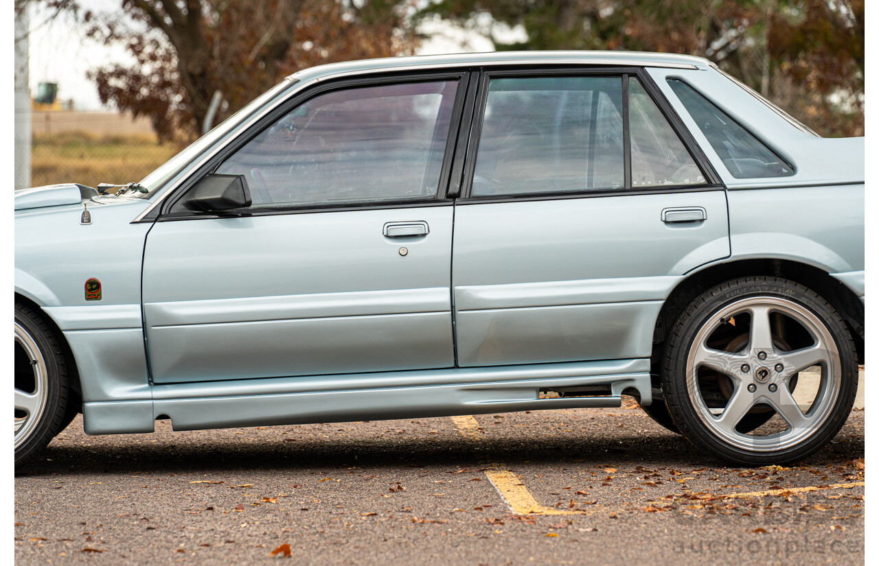 10/1986 Holden VL Commodore Executive - Walkinshaw Group A Replica 4d Sedan Panorama Silver 3.0L