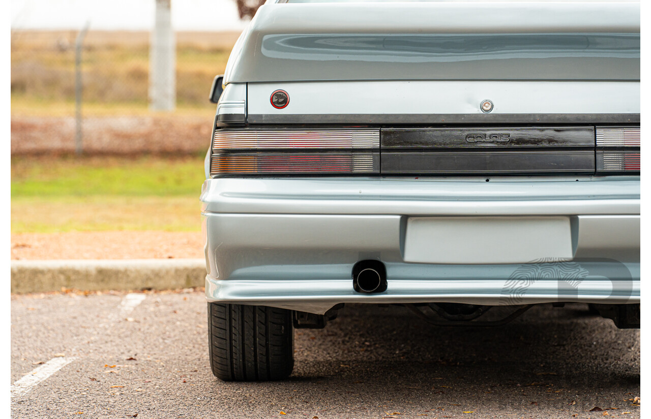 10/1986 Holden VL Commodore Executive - Walkinshaw Group A Replica 4d Sedan Panorama Silver 3.0L