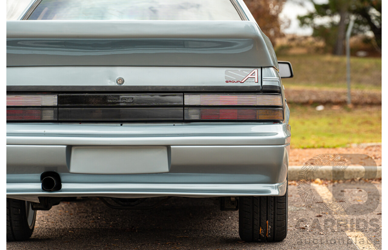 10/1986 Holden VL Commodore Executive - Walkinshaw Group A Replica 4d Sedan Panorama Silver 3.0L