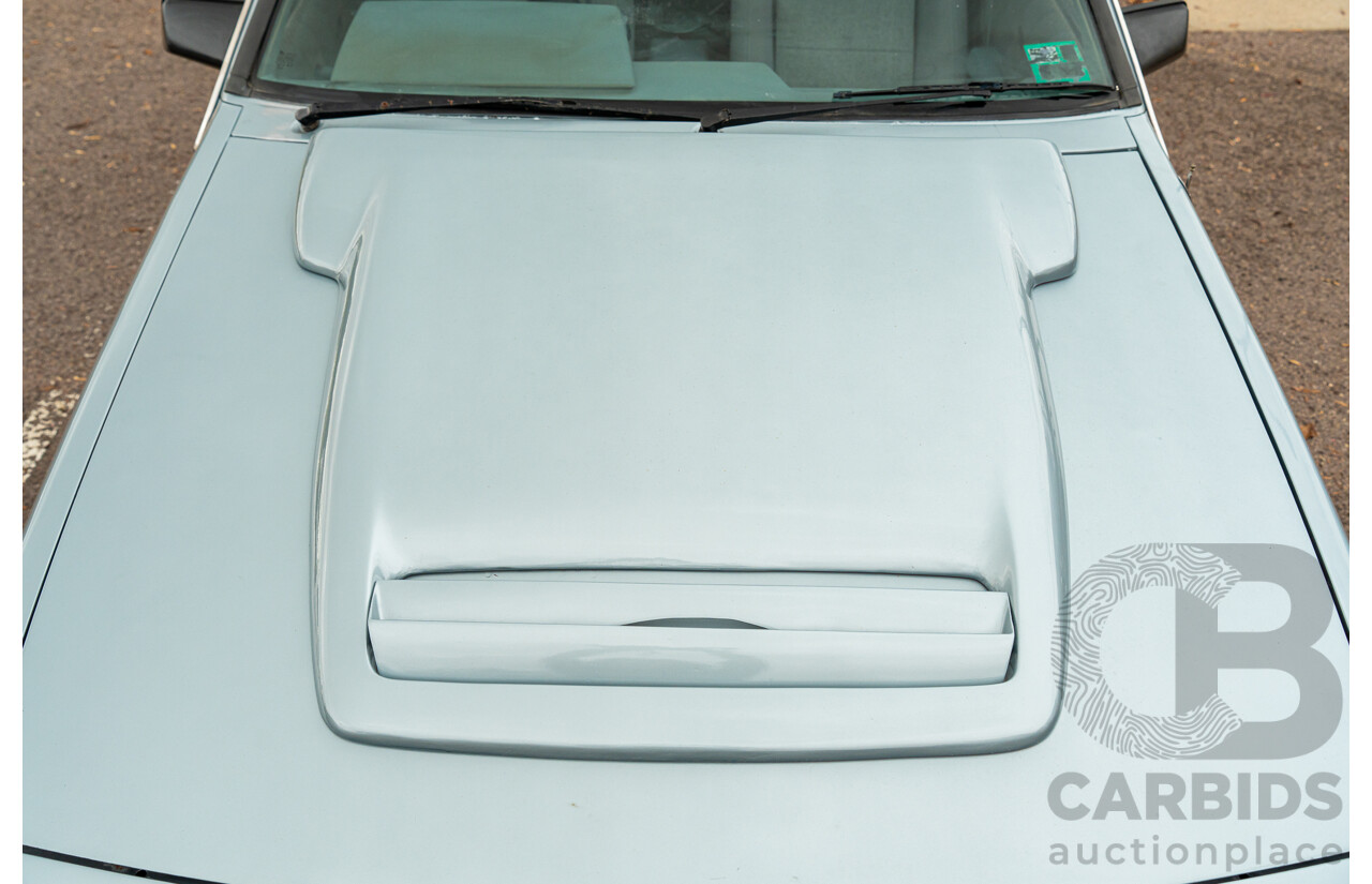 10/1986 Holden VL Commodore Executive - Walkinshaw Group A Replica 4d Sedan Panorama Silver 3.0L