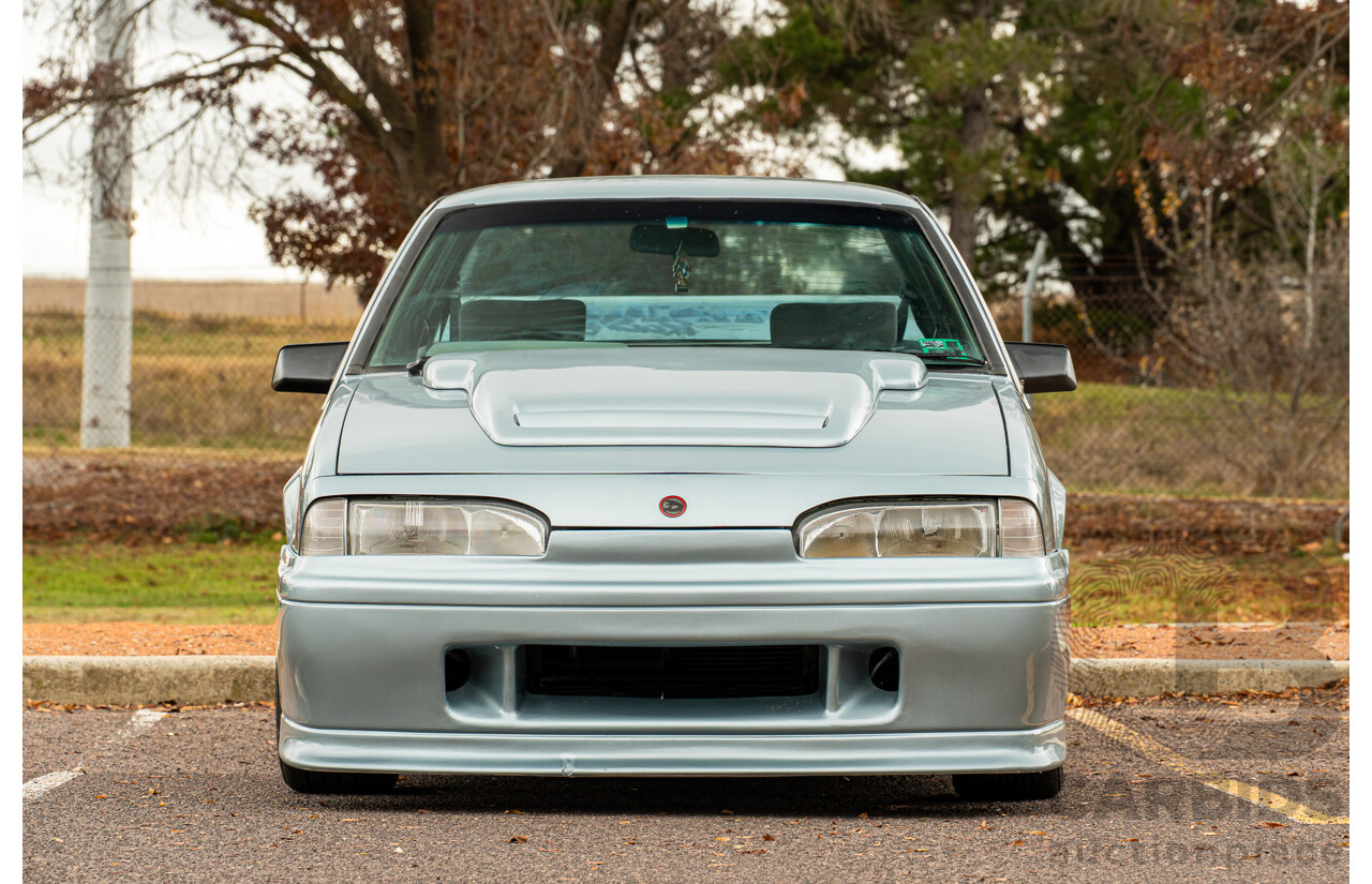 10/1986 Holden VL Commodore Executive - Walkinshaw Group A Replica 4d Sedan Panorama Silver 3.0L
