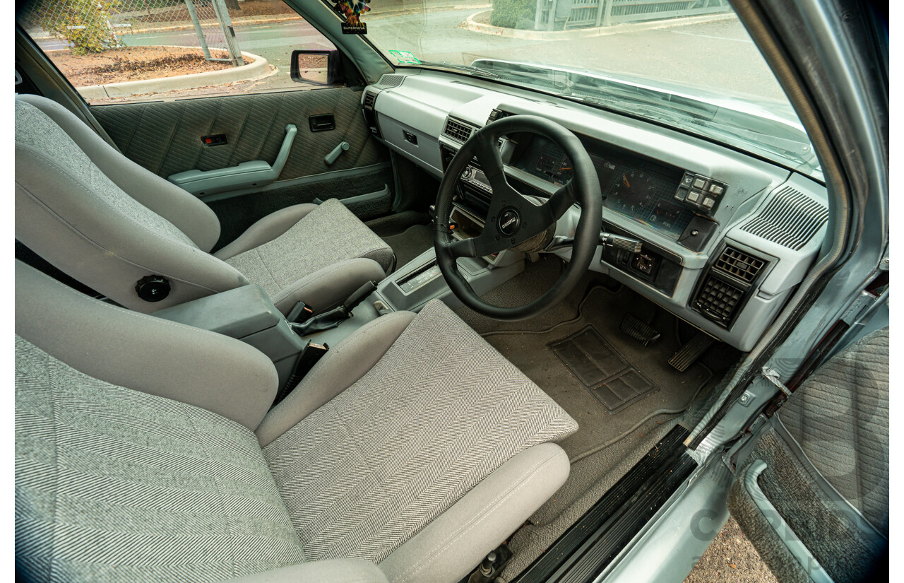 10/1986 Holden VL Commodore Executive - Walkinshaw Group A Replica 4d Sedan Panorama Silver 3.0L
