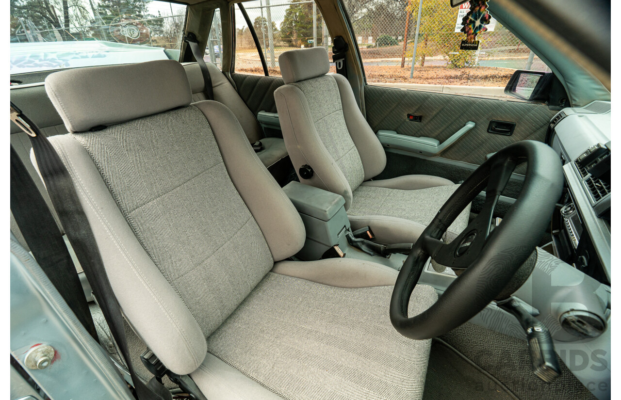 10/1986 Holden VL Commodore Executive - Walkinshaw Group A Replica 4d Sedan Panorama Silver 3.0L
