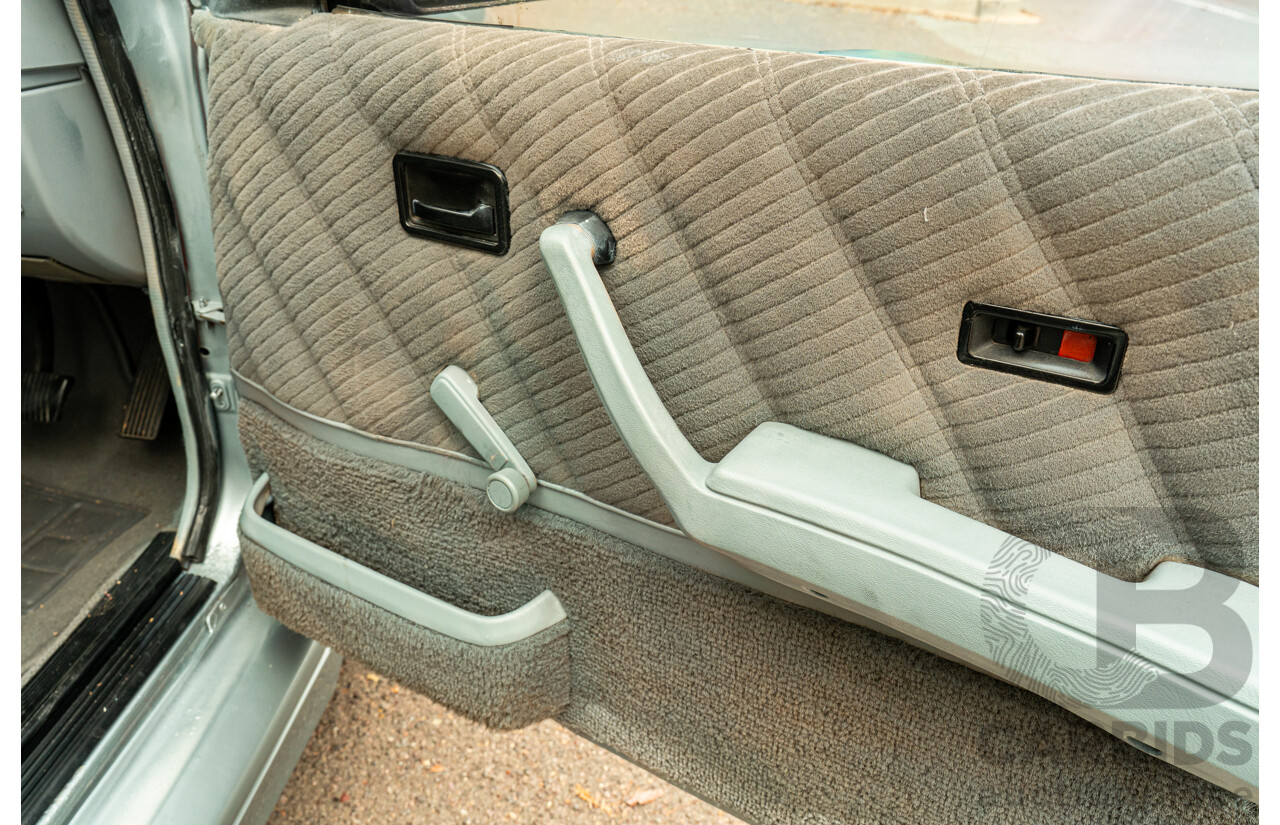 10/1986 Holden VL Commodore Executive - Walkinshaw Group A Replica 4d Sedan Panorama Silver 3.0L