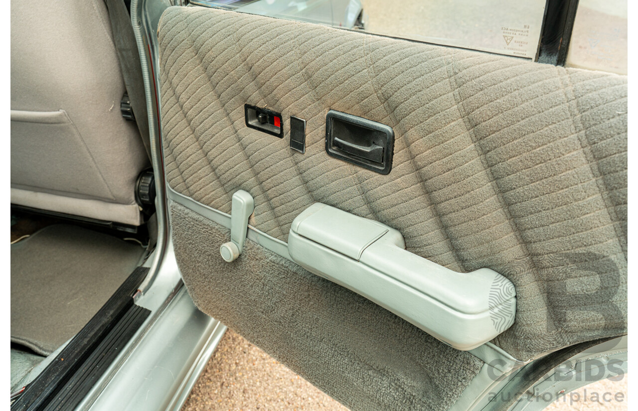 10/1986 Holden VL Commodore Executive - Walkinshaw Group A Replica 4d Sedan Panorama Silver 3.0L
