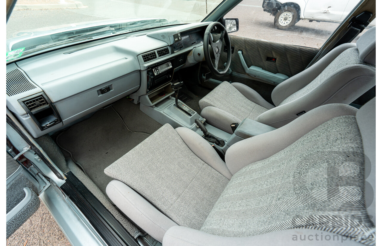 10/1986 Holden VL Commodore Executive - Walkinshaw Group A Replica 4d Sedan Panorama Silver 3.0L