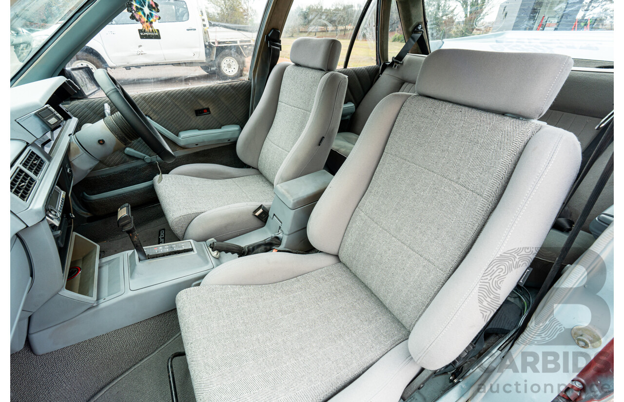 10/1986 Holden VL Commodore Executive - Walkinshaw Group A Replica 4d Sedan Panorama Silver 3.0L