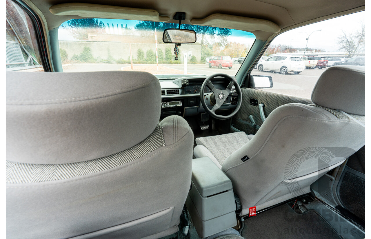 10/1986 Holden VL Commodore Executive - Walkinshaw Group A Replica 4d Sedan Panorama Silver 3.0L