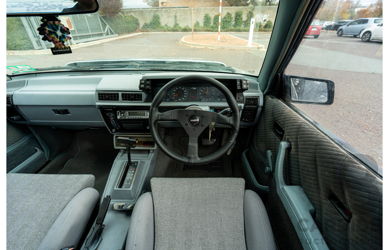 10/1986 Holden VL Commodore Executive - Walkinshaw Group A Replica 4d Sedan Panorama Silver 3.0L