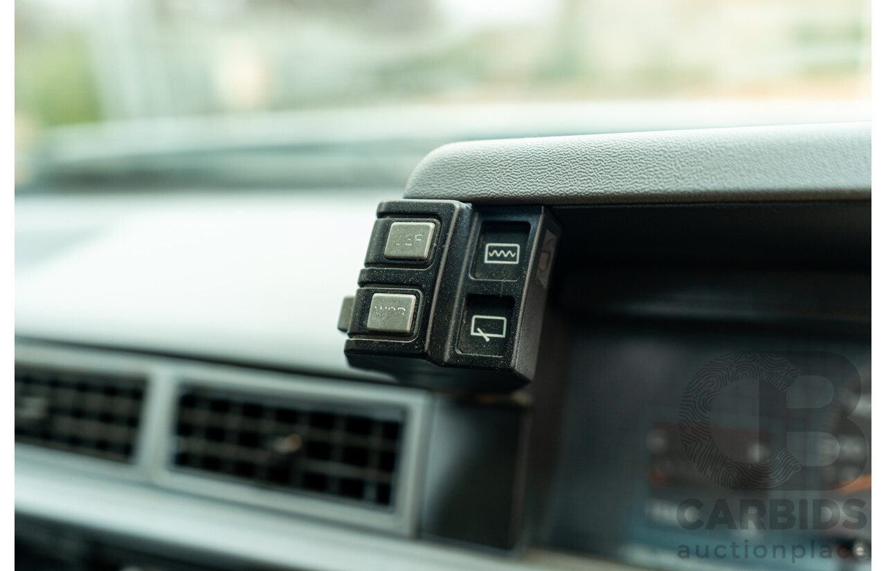 10/1986 Holden VL Commodore Executive - Walkinshaw Group A Replica 4d Sedan Panorama Silver 3.0L