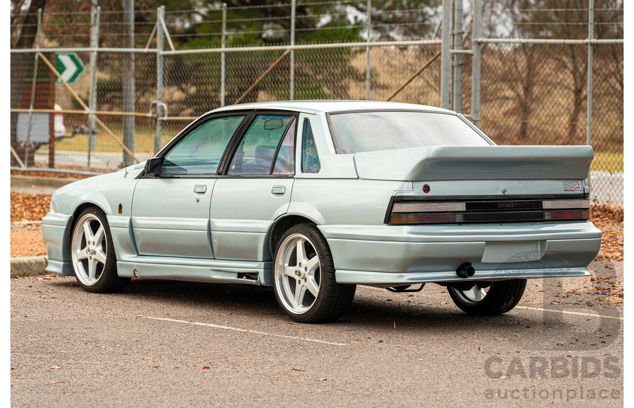10/1986 Holden VL Commodore Executive - Walkinshaw Group A Replica 4d Sedan Panorama Silver 3.0L