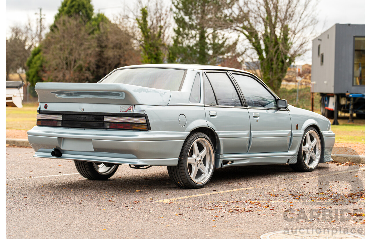 10/1986 Holden VL Commodore Executive - Walkinshaw Group A Replica 4d Sedan Panorama Silver 3.0L