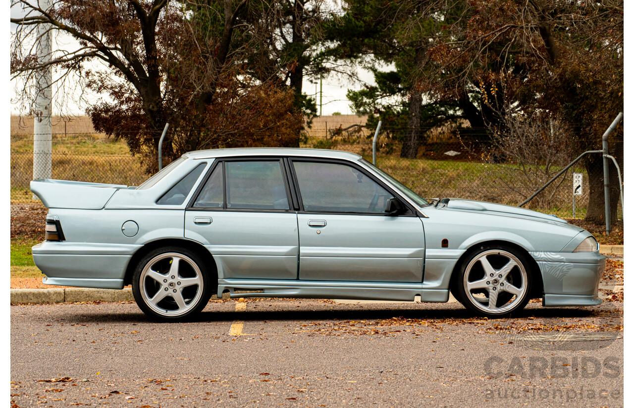 10/1986 Holden VL Commodore Executive - Walkinshaw Group A Replica 4d Sedan Panorama Silver 3.0L