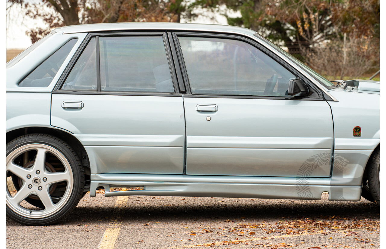 10/1986 Holden VL Commodore Executive - Walkinshaw Group A Replica 4d Sedan Panorama Silver 3.0L