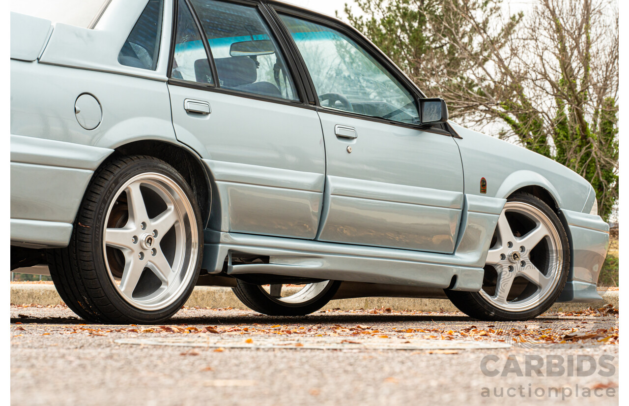 10/1986 Holden VL Commodore Executive - Walkinshaw Group A Replica 4d Sedan Panorama Silver 3.0L