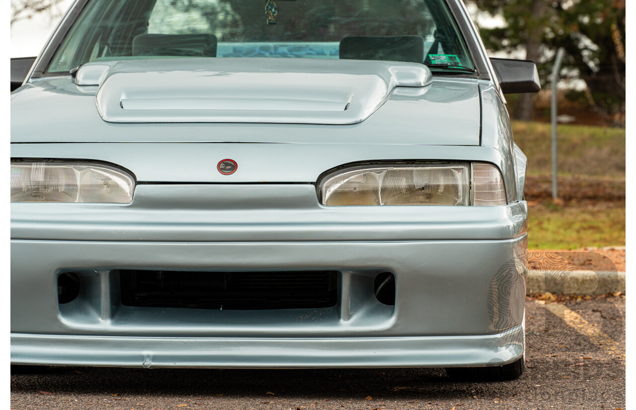 10/1986 Holden VL Commodore Executive - Walkinshaw Group A Replica 4d Sedan Panorama Silver 3.0L