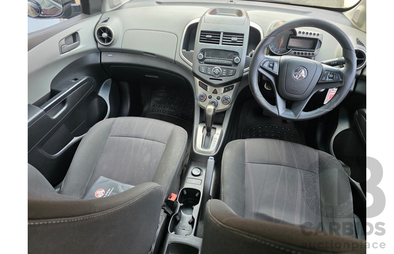 6/2013 Holden Barina CD TM MY13 4d Sedan Black 1.6L