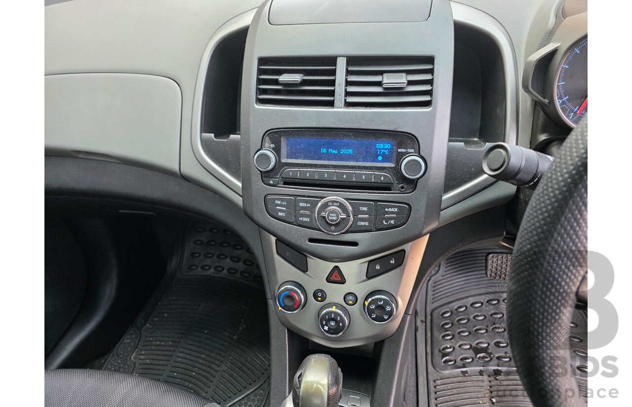6/2013 Holden Barina CD TM MY13 4d Sedan Black 1.6L