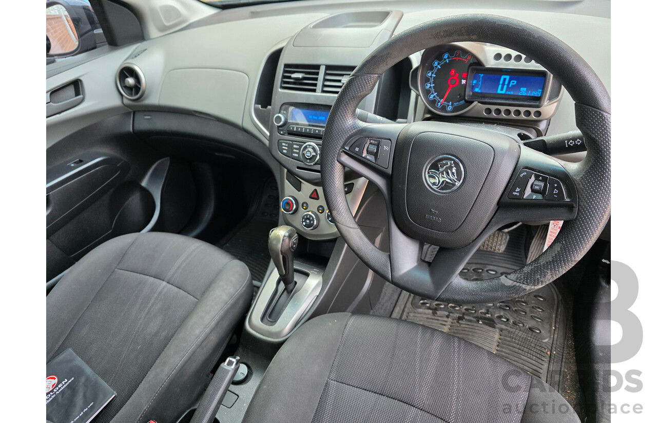 6/2013 Holden Barina CD TM MY13 4d Sedan Black 1.6L