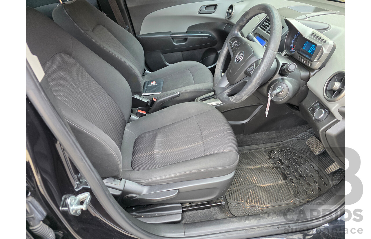 6/2013 Holden Barina CD TM MY13 4d Sedan Black 1.6L