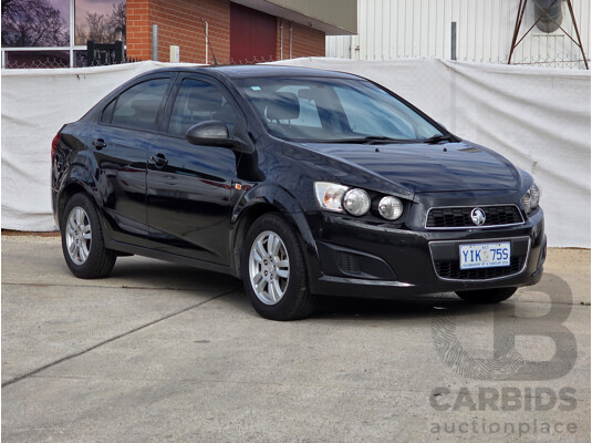 6/2013 Holden Barina CD TM MY13 4d Sedan Black 1.6L